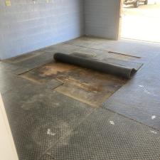 Pressure-washing-horse-stalls-using-hot-water-and-high-pressure-removing-rubber-mats-from-concrete-horse-pens 5